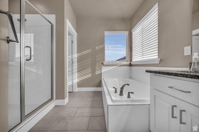 571 S 3350 W, Syracuse, UT 84075 - bathroom featuring tile patterned floors, a stall shower, baseboards, a bath, and vanity