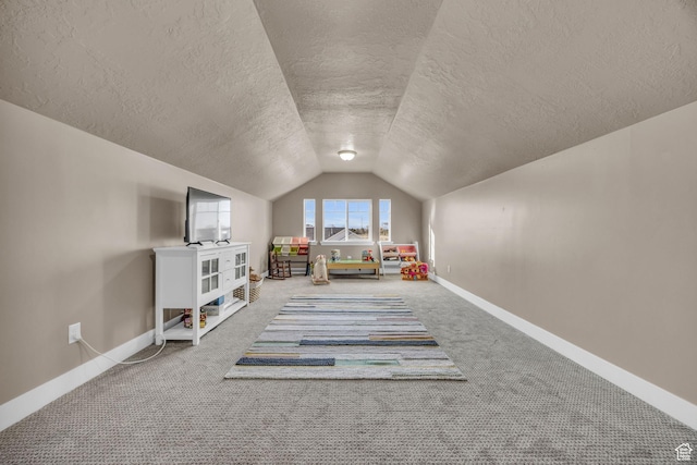 571 S 3350 W, Syracuse, UT 84075 - playroom featuring baseboards, lofted ceiling, a textured ceiling, and carpet floors