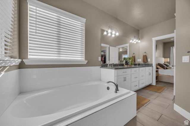 571 S 3350 W, Syracuse, UT 84075 - bathroom featuring a garden tub and vanity