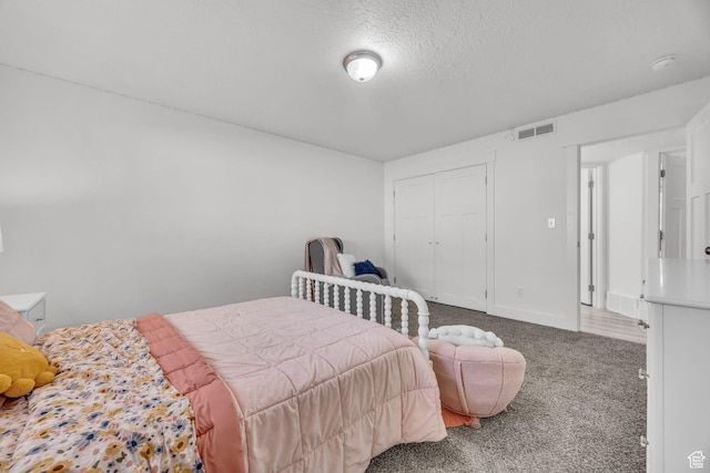 571 S 3350 W, Syracuse, UT 84075 - bedroom with visible vents, baseboards, carpet, a closet, and a textured ceiling