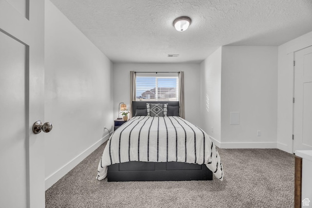 571 S 3350 W, Syracuse, UT 84075 - bedroom featuring visible vents, a textured ceiling, baseboards, and carpet