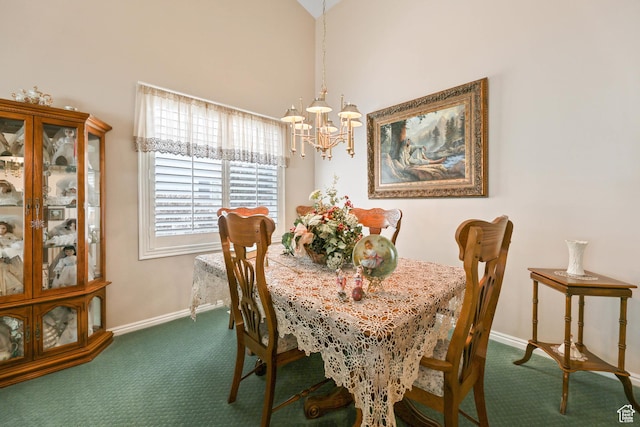 carpeted dining space with baseboards and a chandelier