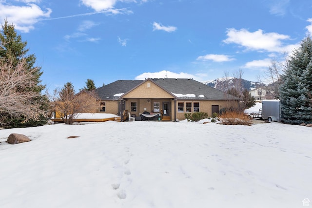 view of snow covered property