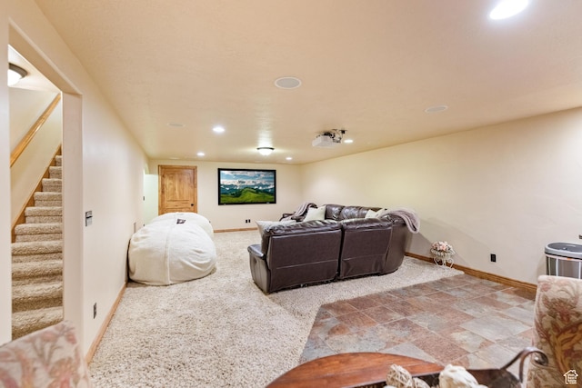 home theater with recessed lighting and baseboards