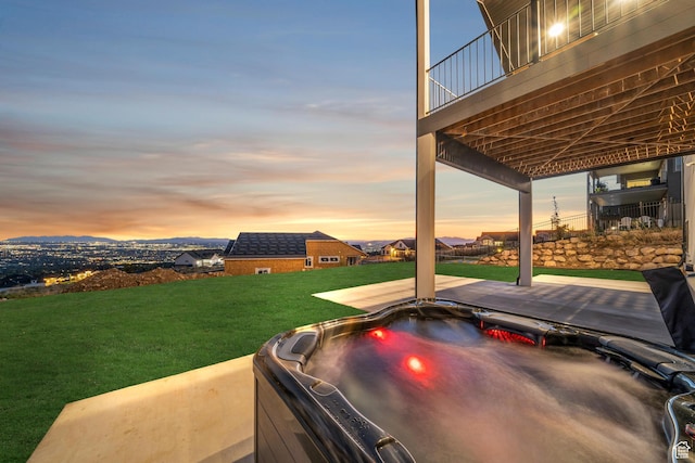 view of patio with a hot tub