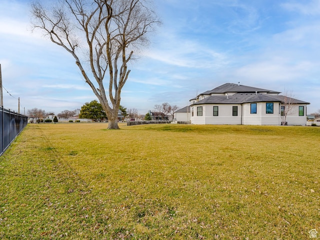 view of yard with fence