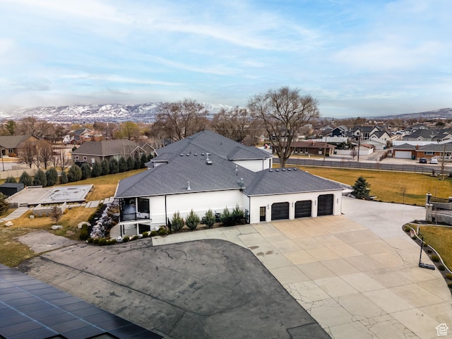 aerial view with a residential view and a mountain view