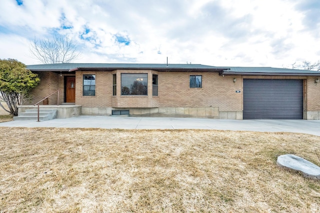600 E 200 N, Mount Pleasant, UT 84647 - single story home with a garage, brick siding, and concrete driveway