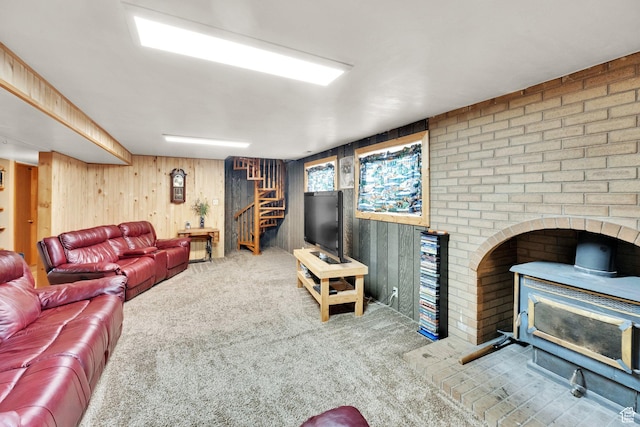 600 E 200 N, Mount Pleasant, UT 84647 - living area with stairway, wood walls, a wood stove, and carpet