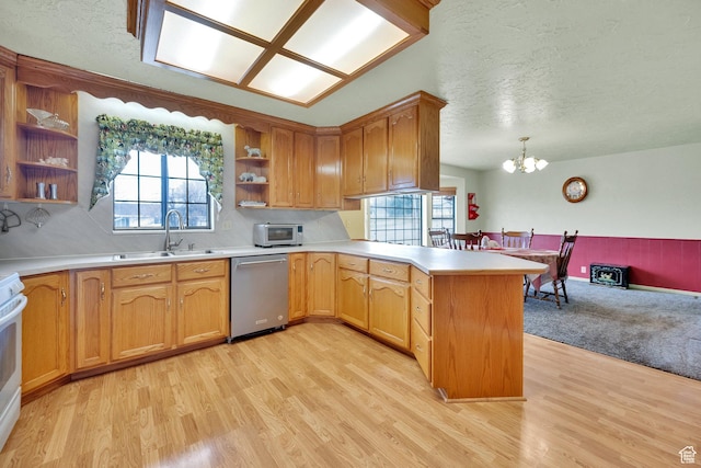 600 E 200 N, Mount Pleasant, UT 84647 - kitchen featuring a sink, open shelves, plenty of natural light, a peninsula, and dishwasher