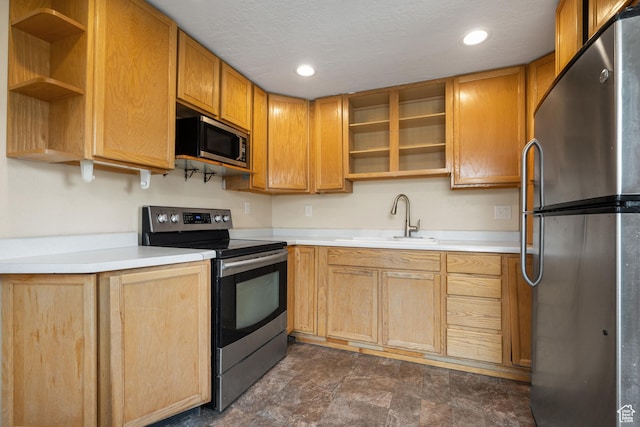 181 S 450 E, Clearfield, UT 84015 - kitchen featuring open shelves, light countertops, recessed lighting, stainless steel appliances, and a sink