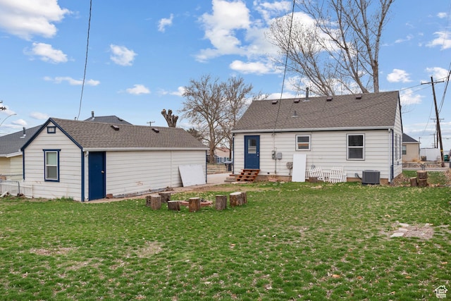 181 S 450 E, Clearfield, UT 84015 - rear view of property featuring central air condition unit, a lawn, entry steps, and fence