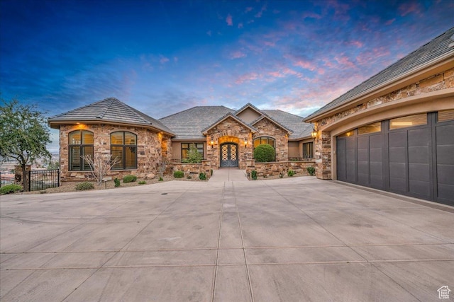 2255 S Hill Rd Unit 14, St George, UT 84790 - french country style house with french doors, stone siding, and driveway