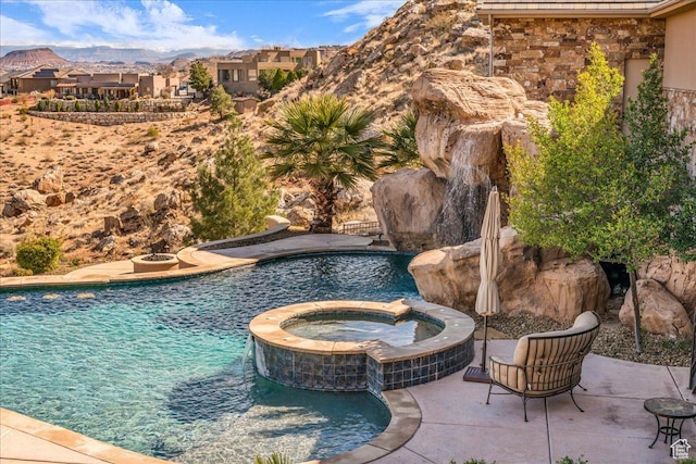 2255 S Hill Rd Unit 14, St George, UT 84790 - view of swimming pool with a patio and a pool with connected hot tub