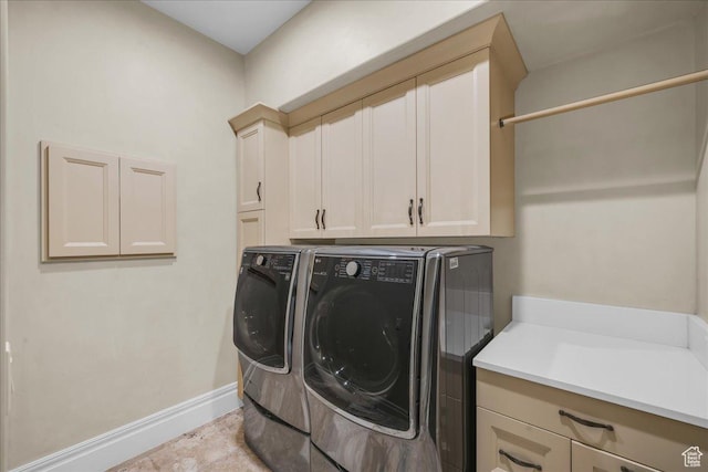 2255 S Hill Rd Unit 14, St George, UT 84790 - laundry area featuring washing machine and dryer, cabinet space, and baseboards
