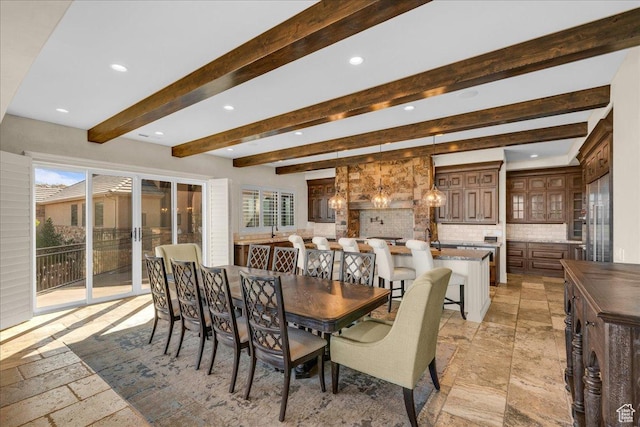 2255 S Hill Rd Unit 14, St George, UT 84790 - dining area featuring recessed lighting, beam ceiling, and stone tile floors