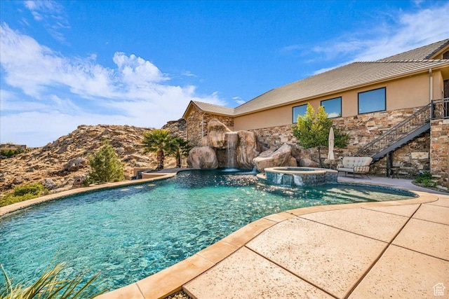 2255 S Hill Rd Unit 14, St George, UT 84790 - view of pool featuring stairway, a pool with connected hot tub, and a patio