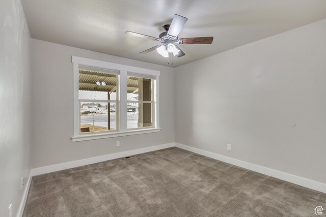 1879 E Tickville Cir, Eagle Mountain, UT 84005 - empty room featuring ceiling fan, baseboards, and carpet flooring