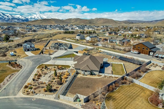 1879 E Tickville Cir, Eagle Mountain, UT 84005 - drone / aerial view featuring a mountain view and a residential view