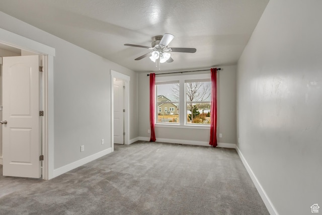 1879 E Tickville Cir, Eagle Mountain, UT 84005 - carpeted spare room with a ceiling fan and baseboards