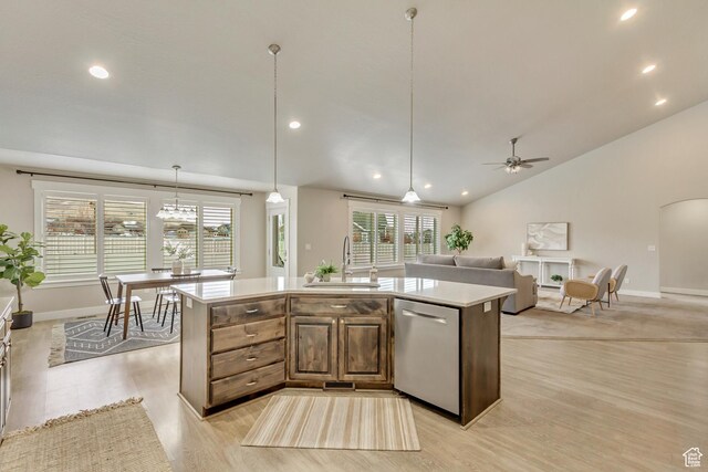 1879 E Tickville Cir, Eagle Mountain, UT 84005 - kitchen featuring a sink, light wood-style flooring, dishwasher, light countertops, and recessed lighting