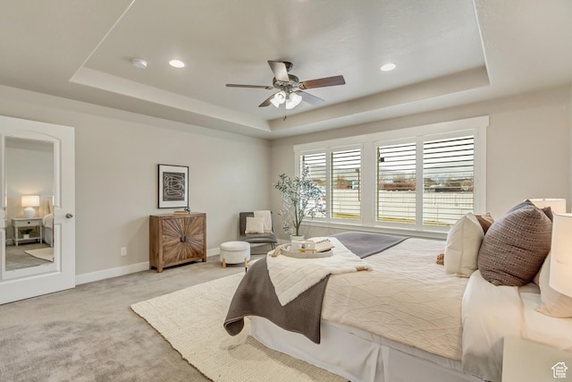 1879 E Tickville Cir, Eagle Mountain, UT 84005 - carpeted bedroom with baseboards, a ceiling fan, a tray ceiling, and recessed lighting