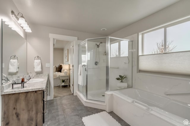 1879 E Tickville Cir, Eagle Mountain, UT 84005 - ensuite bathroom featuring ensuite bath, a garden tub, vanity, and a stall shower