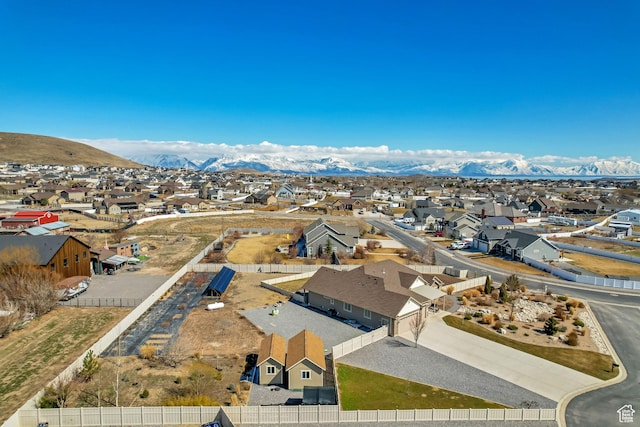 1879 E Tickville Cir, Eagle Mountain, UT 84005 - drone / aerial view featuring a residential view and a mountain view