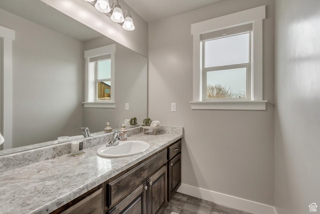 1879 E Tickville Cir, Eagle Mountain, UT 84005 - bathroom with baseboards and vanity