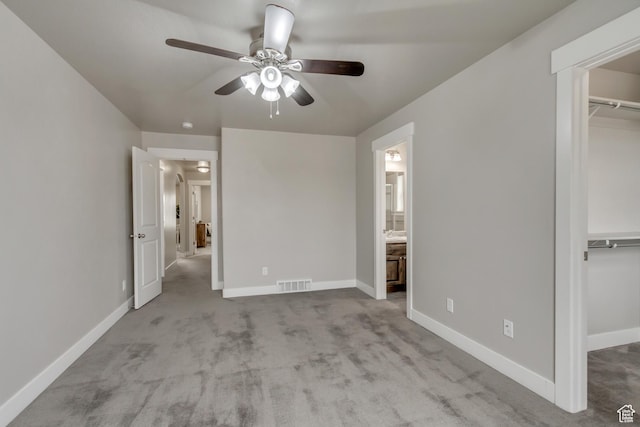 1879 E Tickville Cir, Eagle Mountain, UT 84005 - unfurnished bedroom with baseboards, visible vents, a spacious closet, a closet, and carpet floors