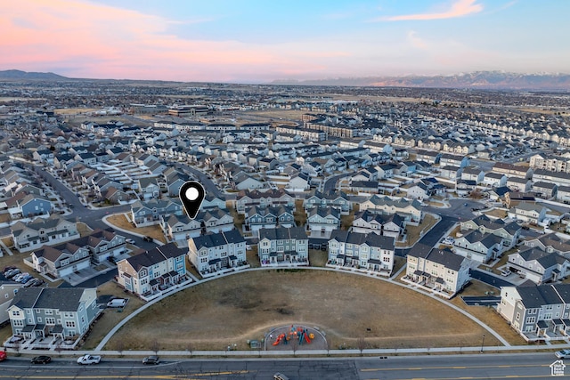 aerial view at dusk with a residential view