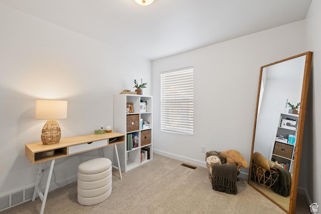 carpeted home office with baseboards and visible vents