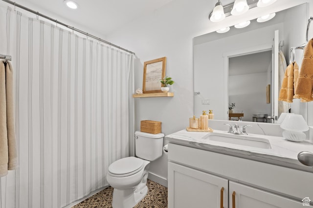 full bath with baseboards, toilet, vanity, a shower with curtain, and tile patterned flooring