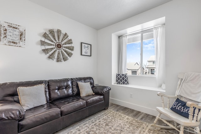 671 W 660 S, Tooele, UT 84074 - living room featuring wood finished floors and baseboards
