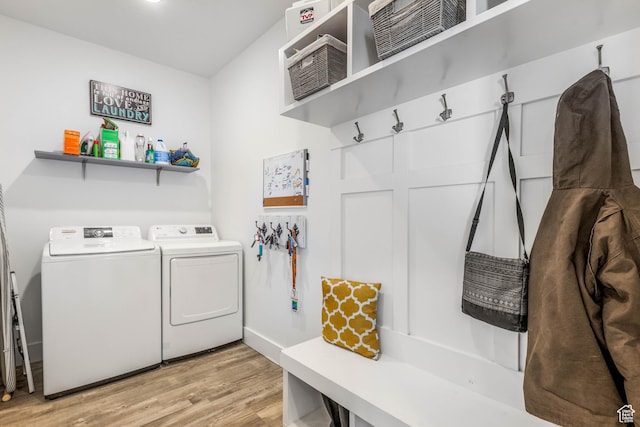 671 W 660 S, Tooele, UT 84074 - washroom with laundry area, light wood finished floors, and washing machine and dryer