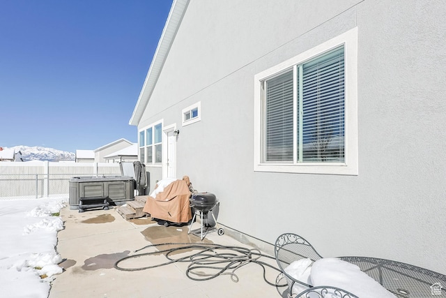 671 W 660 S, Tooele, UT 84074 - view of patio / terrace with fence and a hot tub