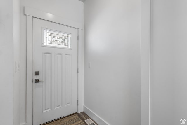 671 W 660 S, Tooele, UT 84074 - doorway with baseboards, visible vents, and dark wood-type flooring