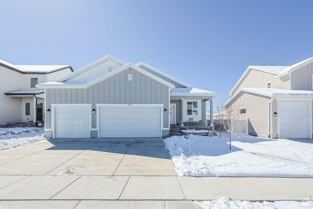 671 W 660 S, Tooele, UT 84074 - ranch-style house featuring driveway, covered porch, board and batten siding, and an attached garage