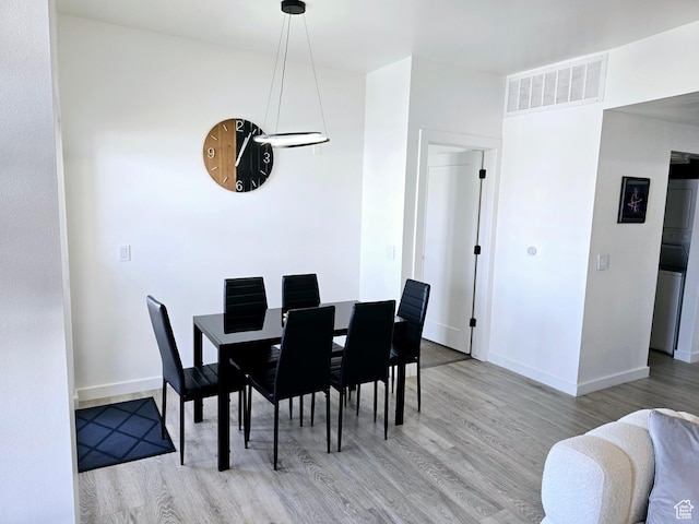 900 Bitner Rd Unit G-32, Park City, UT 84098 - dining area featuring visible vents, baseboards, and wood finished floors