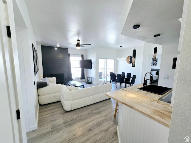 900 Bitner Rd Unit G-32, Park City, UT 84098 - living area featuring light wood finished floors and a ceiling fan