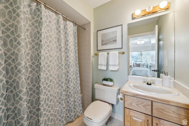 1919 E Baywood Dr, Holladay, UT 84117 - full bath featuring ensuite bathroom, a shower with shower curtain, toilet, vanity, and tile patterned flooring