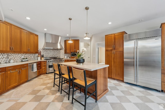 1919 E Baywood Dr, Holladay, UT 84117 - kitchen with brown cabinets, wall chimney range hood, light floors, and premium appliances