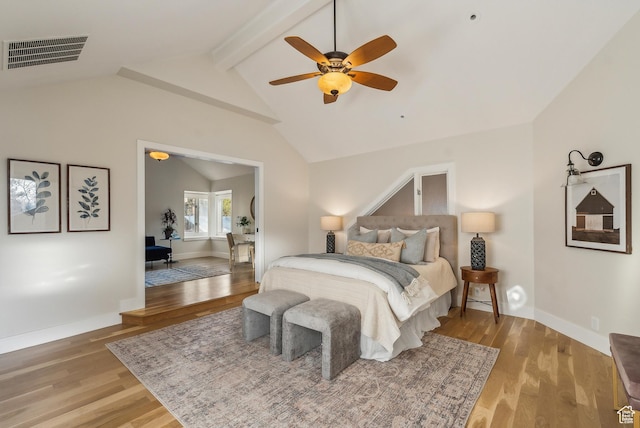 1919 E Baywood Dr, Holladay, UT 84117 - bedroom with baseboards, wood finished floors, lofted ceiling with beams, and visible vents