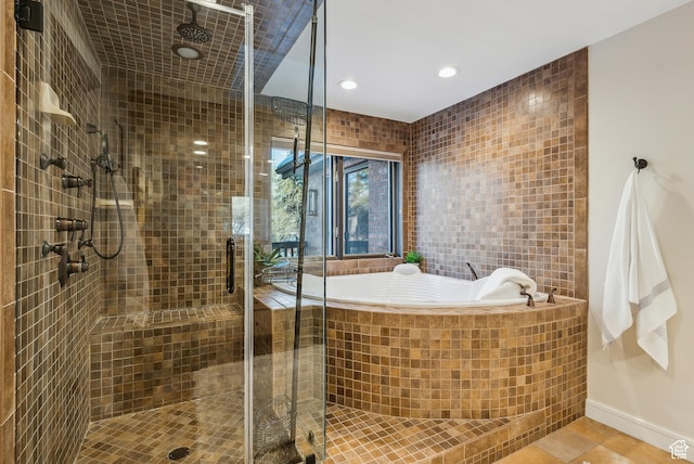 1919 E Baywood Dr, Holladay, UT 84117 - full bathroom with a stall shower, recessed lighting, tile patterned flooring, tile walls, and a garden tub