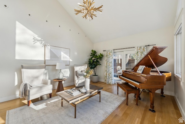1919 E Baywood Dr, Holladay, UT 84117 - living area with high vaulted ceiling, french doors, baseboards, and wood finished floors