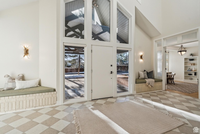 1919 E Baywood Dr, Holladay, UT 84117 - interior space featuring high vaulted ceiling, tile patterned floors, and baseboards