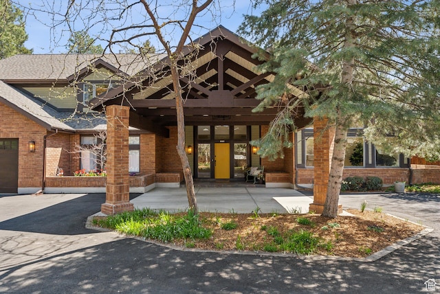 1919 E Baywood Dr, Holladay, UT 84117 - view of front of property featuring roof with shingles and brick siding