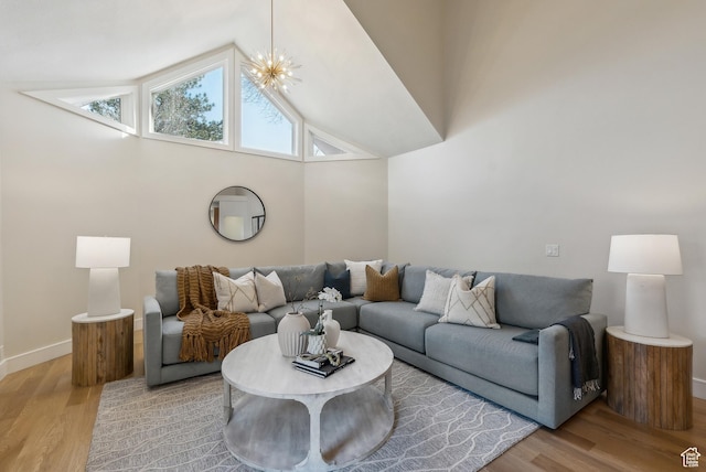 1919 E Baywood Dr, Holladay, UT 84117 - living area with light wood finished floors, baseboards, and lofted ceiling
