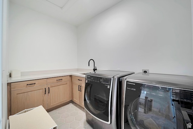 563 W Founders Blvd Unit 90, Saratoga Springs, UT 84045 - washroom with independent washer and dryer, cabinet space, and light tile patterned floors