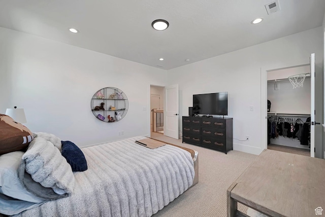 563 W Founders Blvd Unit 90, Saratoga Springs, UT 84045 - bedroom featuring light colored carpet, a spacious closet, recessed lighting, and a closet